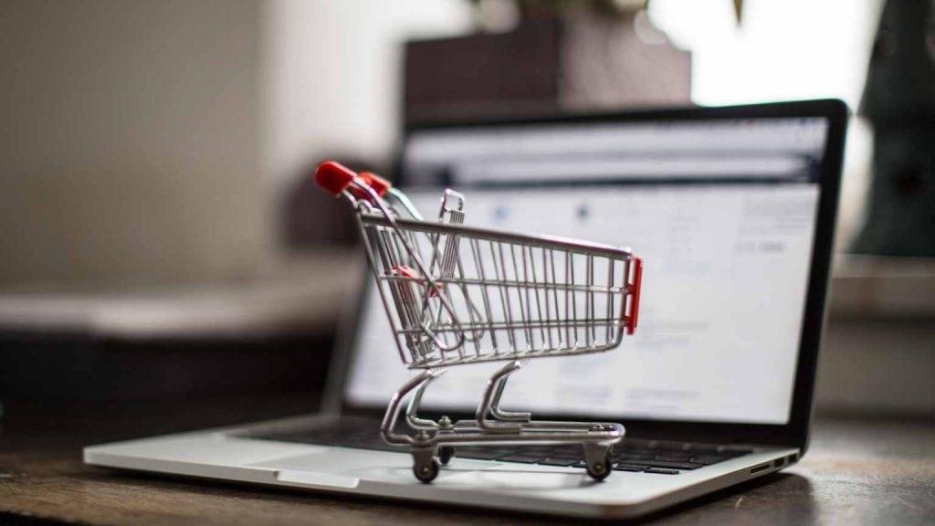 A Shopping Cart On a Laptop Showing E-Commerce Stores-Cedric Millar Canada Supply Chain Logistics Company